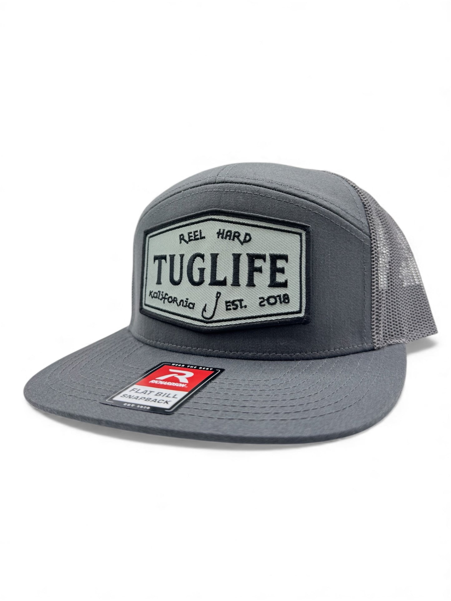 The Classic 7 panel Reel Hard trucker snapback